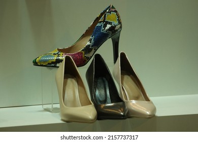 Showcase With Female Shoes In Shopping Mall. Shelf Of Ladies Shoes In Shop. Womens Fashion And Style.