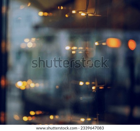 Showcase reflecting night city lights, abstract urban background and tech texture
