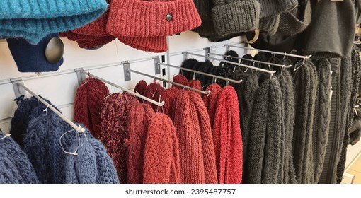 Showcase of stall with variety of women hats for the autumnmwinter season. Shop knitted hats scarves hats - Shutterstock ID 2395487757