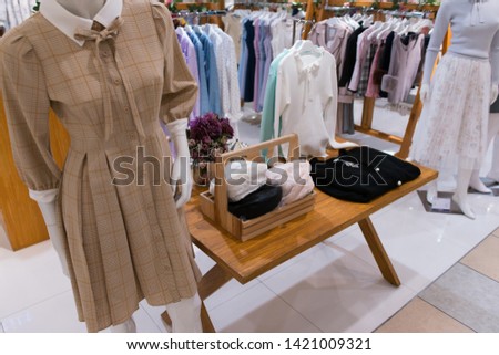 Showcases fashion boutique Clothing store in a modern shopping mall. Cloth and acessorie modern shop