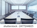 The showcases a modern, professional conference room setting.Room features a large wooden table surrounded by black mesh office chairs, indicating a space designed for meetings or collaborative work. 