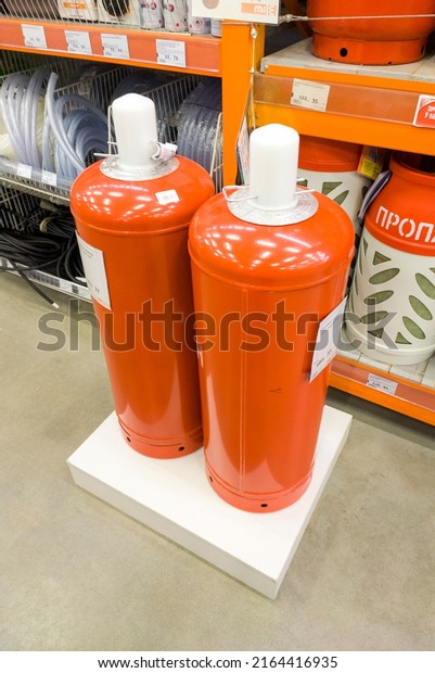 Showcases and shelves
with propane gas cylinders in the mall construction store. 03 June
2022, Minsk, Belarus