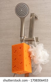 Shower Accessories, Diffuser, Spray, Diverter, Aerator And Orange, White Washcloth Weigh On The Hook. All For The Shower