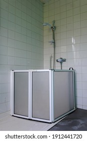 Shower Enclosure For A Wheelchair User In A Large Hospital Bathroom