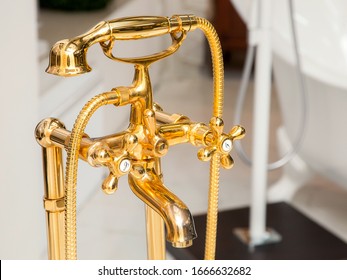 Shower Faucet With Valve Taps And A Mixer Of Gold Color In Retro Style, Shower Diffuser Close Up.