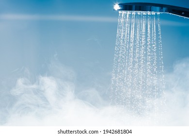 shower with flowing water and steam - Shutterstock ID 1942681804