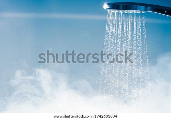 shower with flowing water\
and steam