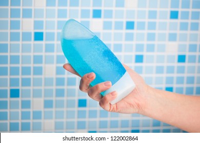 shower gel in hand