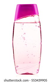shower gel in a pink bottle close-up on a white background isolated