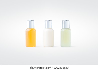 Shower Gel, Shampoo And Body Lotion Isolated On Background. Hotel Amenity Kit