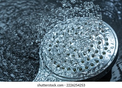 shower head with flowing water - Shutterstock ID 2226254253