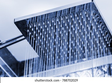 shower head with rain spout in the bathroom.  image