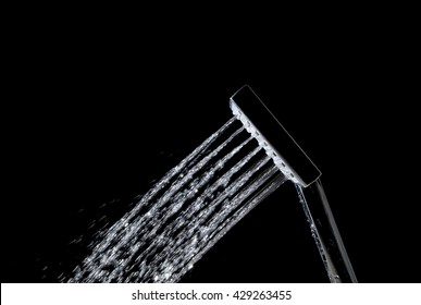 Shower With Jets Of Water Close Up Isolated On A Black Background