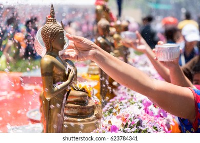 Shower The Monk Sculpture With Songkran Festival Thailand