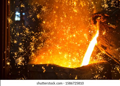 Shower Of Sparks As Molten Metal Is Poured In Steel Foundry