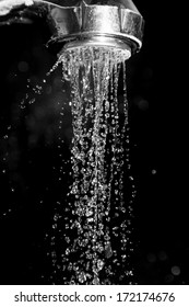 Shower With Water Isolated On A Black Background