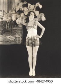 Showgirl Wearing Feathered Headdress