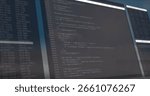Showing dual monitors presenting JavaScript code and log entries on desk, with monitor stands. Technology, development, coding, programming, workspace, digital, interface