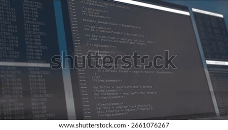 Showing dual monitors presenting JavaScript code and log entries on desk, with monitor stands. Technology, development, coding, programming, workspace, digital, interface