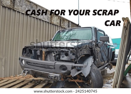 Showing a heavily damaged high end vehicle background with ' CA$H FOR YOUR SCAP CAR' words overhead . For small business or auto salvage yard. Imagine de stoc © 
