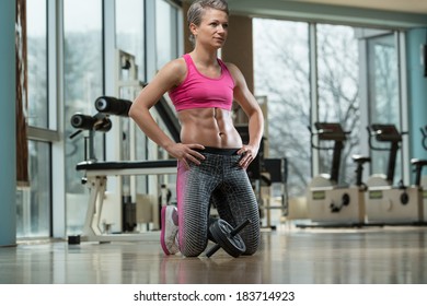 Showing Her Six Pack - Portrait Of A Physically Fit Muscular Young Woman