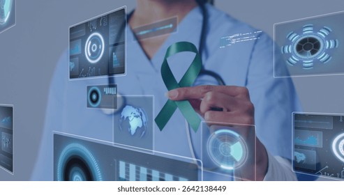 Showing medical worker in scrubs holding green awareness ribbon in clinic, with panels. Healthcare, technology, data, visualization, digital, innovation, wellness