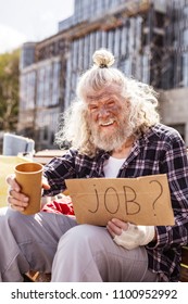 Showing Mercy. Depressed Jobless Man Asking For Money While Being Hungry