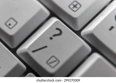 Showing a question mark button on a computer keyboard
