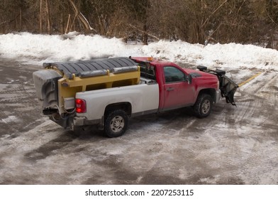 Showing A Snow Plow And Salt Truck Background.