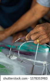 Shows The Hand Of A Basket Weaver