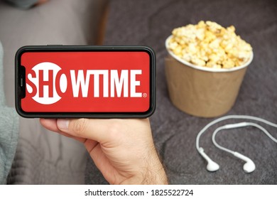 Showtime Logo On The Mobile Phone Screen With Popcorn Box And Apple Earpods On The Background, September 2020, San Francisco, USA