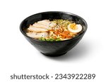 Shoyu Ramen with pork in a bowl on white background. The image is fully sharp, front to back. Clipping path.
