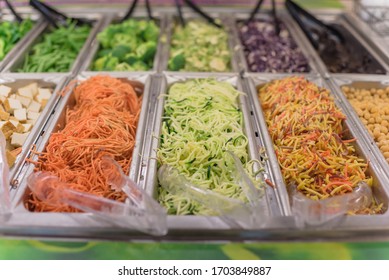 Shredded Carrot, Cucumber, Tofu And Bean At Salad Bar In High-end Grocery Store Near Dallas, Texas, America. Colorful Fresh And Organic Vegetable In Self-service Counter.