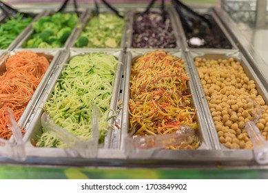 Shredded Carrot, Cucumber, Tofu And Bean At Salad Bar In High-end Grocery Store Near Dallas, Texas, America. Colorful Fresh And Organic Vegetable In Self-service Counter.