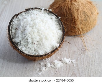 Shredded Coconut in coconut shell. kelapa parut di tempurung kelapa or batok kelapa