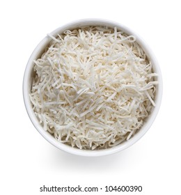 Shredded Coconut In White Bowl, Isolated On White With Shadow.  Overhead View.