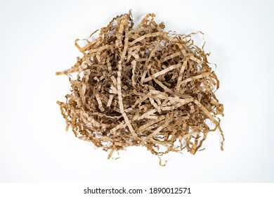 Shredded Kraft Paper Close-up Isolated On White Background.