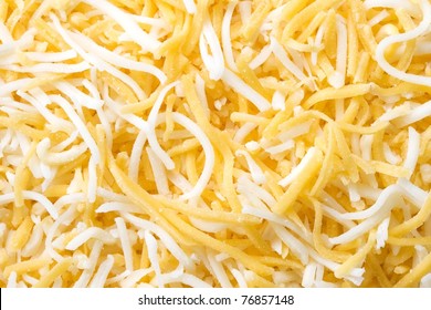 Shredded Monterey Jack And Cheddar Cheese Closeup Background