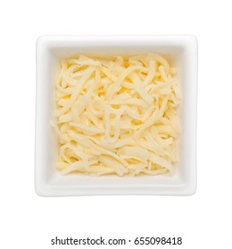 Shredded Mozzarella Cheese In A Square Bowl Isolated On White Background
