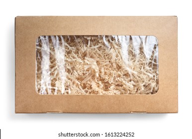 Shredded paper for gifting and stuffing in cardboard box. Top view.