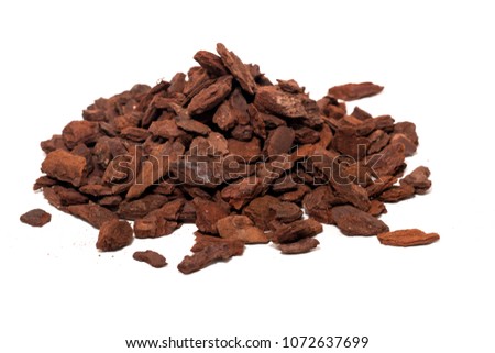 Shredded tree bark used for gardening isolated on a white background.