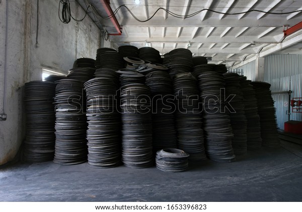shredded\
waste tire warehouse, car tire recycling\
factory