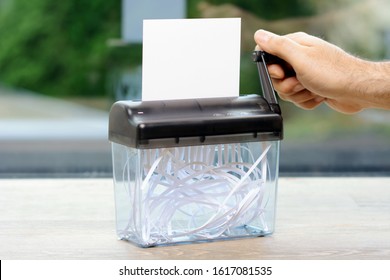 Shredder With Empty Card With Copy Space Is Shredded