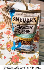 SHREWSBURY, MASSACHUSETTS - May 21, 2017 : Snyders Of Hanover Gluten Free Pretzel Sticks. Honey Mustard & Onion Flavored Pretzels Produced By Snyders Of Hanover ; Gluten Free, Dairy Free, Casein Free