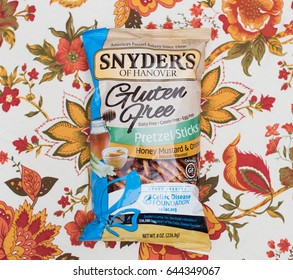 SHREWSBURY, MASSACHUSETTS - May 21, 2017 : Snyders Of Hanover Gluten Free Pretzel Sticks. Honey Mustard & Onion Flavored Pretzels Produced By Snyders Of Hanover ; Gluten Free, Dairy Free, Casein Free