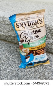 SHREWSBURY, MASSACHUSETTS - May 21, 2017 : Snyders Of Hanover Gluten Free Pretzel Sticks. Honey Mustard & Onion Flavored Pretzels Produced By Snyders Of Hanover ; Gluten Free, Dairy Free, Casein Free