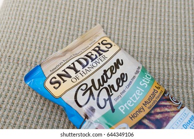 SHREWSBURY, MASSACHUSETTS - May 21, 2017 : Snyders Of Hanover Gluten Free Pretzel Sticks. Honey Mustard & Onion Flavored Pretzels Produced By Snyders Of Hanover ; Gluten Free, Dairy Free, Casein Free