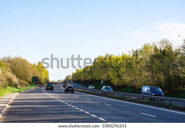 Shrewsbury/Uk-04.20.2018:Traffic on A5 express\
way on beautiful spring day, not too busy, good weather, perfect\
driving conditions.Highway Uk,Dual carriage road.Driving Uk.Highway\
mild\
traffic.