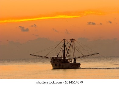 A Shrimp Boat Off St Simons Island, Georgia At Sunset.