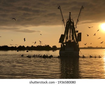 Shrimp Boat At Sunset In The Sound